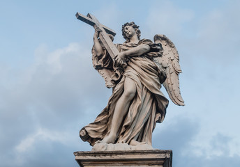Fototapeta premium Sculpture of an angel on the bridge of Sant'Angelo in Rome, Ital