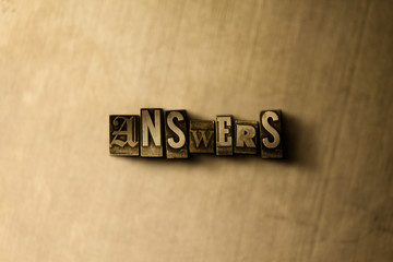 ANSWERS - close-up of grungy vintage typeset word on metal backdrop. Royalty free stock - 3D rendered stock image.  Can be used for online banner ads and direct mail.