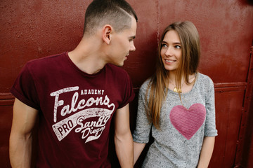 Couple in love. Happy young couple in love looking at each other and smiling. Love story.