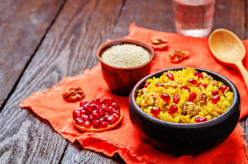 Turmeric quinoa with pomegranate and walnuts