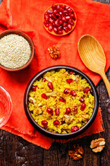 Turmeric quinoa with pomegranate and walnuts