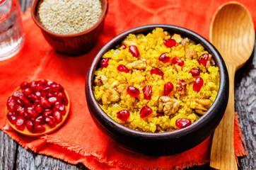 Turmeric quinoa with pomegranate and walnuts