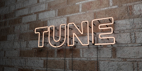 TUNE - Glowing Neon Sign on stonework wall - 3D rendered royalty free stock illustration.  Can be used for online banner ads and direct mailers..