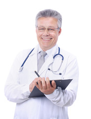 Happy smiling mature doctor writing on clipboard