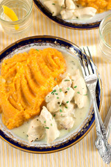 Chicken bites in creamy sauce gravy with estragon tarragon