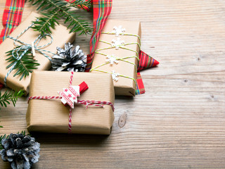 Christmas presents on wooden background, retro style with copy space