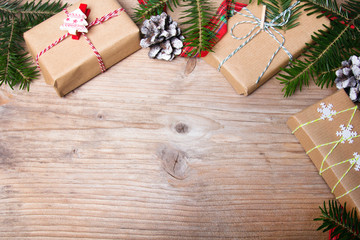 Christmas presents on wooden background, retro style with copy space