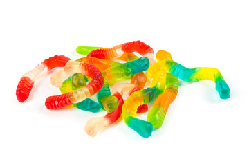 Multicolored gummy worms isolated on a white background