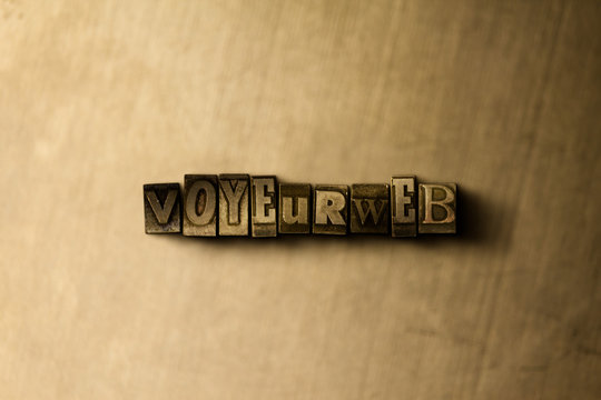 VOYEURWEB - close-up of grungy vintage typeset word on metal backdrop. Royalty free stock - 3D rendered stock image.  Can be used for online banner ads and direct mail.