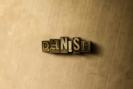 DANISH - close-up of grungy vintage typeset word on metal backdrop. Royalty free stock - 3D rendered stock image.  Can be used for online banner ads and direct mail.