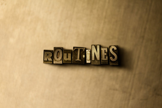 ROUTINES - close-up of grungy vintage typeset word on metal backdrop. Royalty free stock - 3D rendered stock image.  Can be used for online banner ads and direct mail.