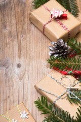 Christmas presents on wooden background, retro style with copy space