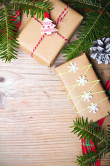 Christmas presents on wooden background, retro style with copy space