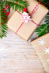 Christmas presents on wooden background, retro style with copy space
