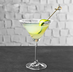 Delicious cocktail on gray table