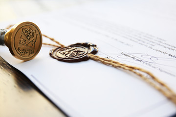 Old notarial wax stamp on document, closeup