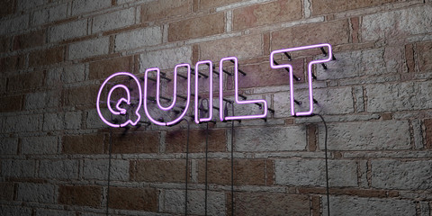 QUILT - Glowing Neon Sign on stonework wall - 3D rendered royalty free stock illustration.  Can be used for online banner ads and direct mailers..