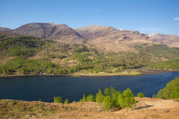 Beautiful Scottish Loch Leven Scotland UK in summer with mountains sunshine and blue sky