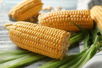 Fresh corncobs on napkin, closeup