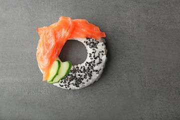 Sushi doughnut on grey textured background
