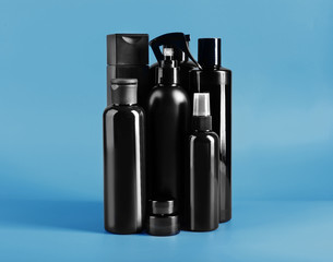 Set of body care products on blue background