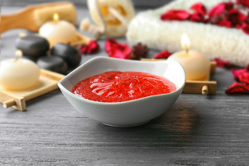 Still life with body scrub on wooden background