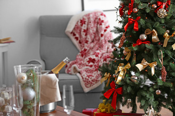 Naklejka na ściany i meble Decorated Christmas tree at home