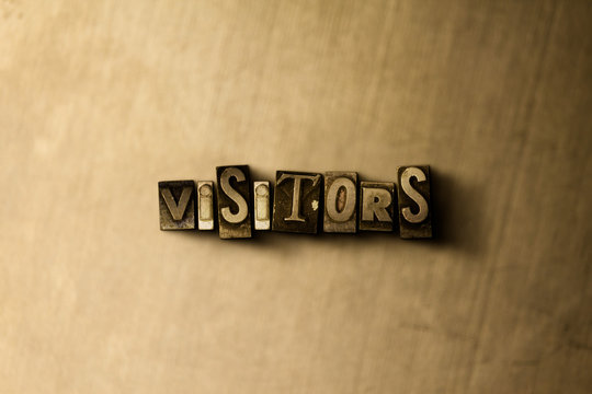 VISITORS - close-up of grungy vintage typeset word on metal backdrop. Royalty free stock - 3D rendered stock image.  Can be used for online banner ads and direct mail.