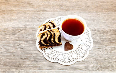 Traditional french colored  Black tea with cake