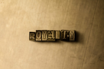 ROYALTY - close-up of grungy vintage typeset word on metal backdrop. Royalty free stock - 3D rendered stock image.  Can be used for online banner ads and direct mail.