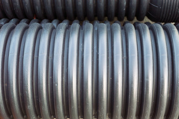 Close up view of garnered black plastic substructure pipes