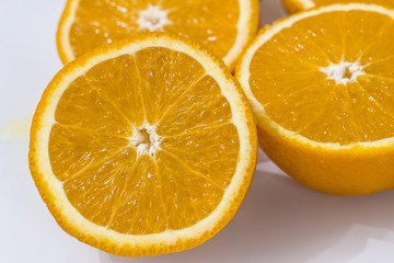 halves of orange isolated on white background