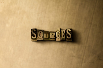 SOURCES - close-up of grungy vintage typeset word on metal backdrop. Royalty free stock - 3D rendered stock image.  Can be used for online banner ads and direct mail.