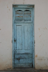 Antique door with peeling paint