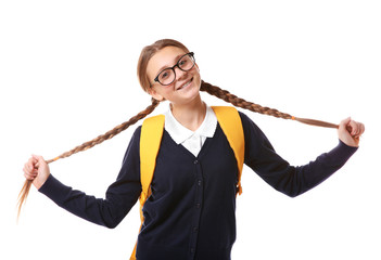 Teenage girl with backpack standing on white background