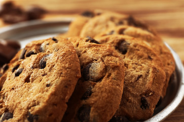 Tasty chocolate cookies on tray, closeup