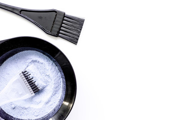 Tools for hair dye and hairdye top view white background