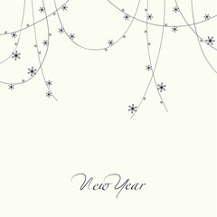 The design of the cards. Garland with snowflakes of varying size at the top of the card. At the bottom of the card the phrase new year.