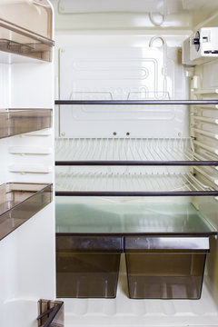 Empty shelves in a refrigerator