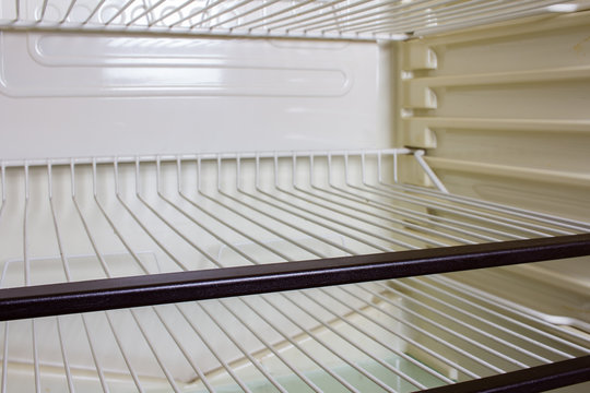 Empty shelves in a refrigerator