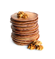 Tasty pancakes with walnut isolated on white