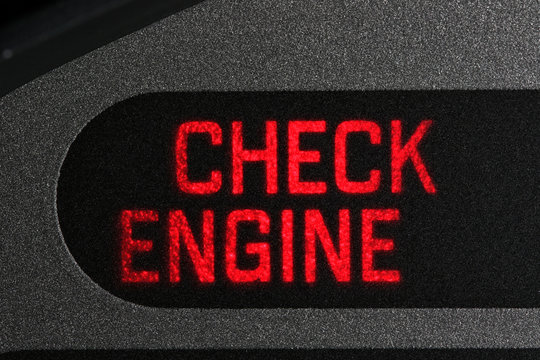 check engine warning light in car dashboard