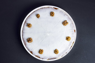 Pumpkin tart with lemon glaze and walnuts
