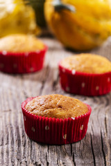 Pumpkin muffins on a wooden table