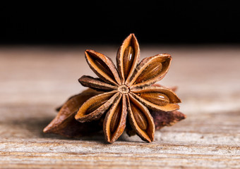 Anise star on vintage wooden table