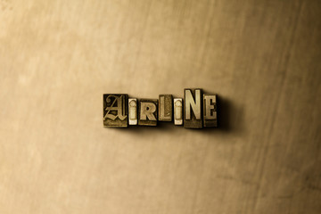 AIRLINE - close-up of grungy vintage typeset word on metal backdrop. Royalty free stock - 3D rendered stock image.  Can be used for online banner ads and direct mail.