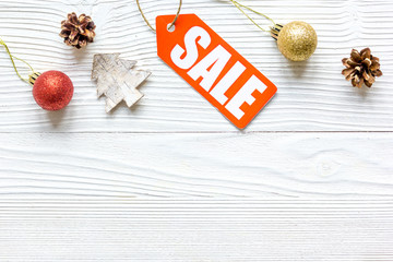 Christmas sales on wooden background top view