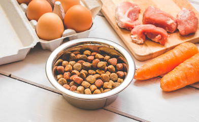 ingredients for pet food natural on wooden background