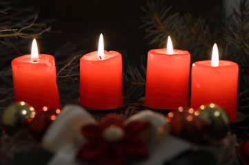 Advent candles on dark background. Christmas time concept