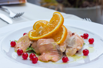 Salmon marinated into orange